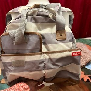 Gray strip with brown accents, ipack baby backpack.